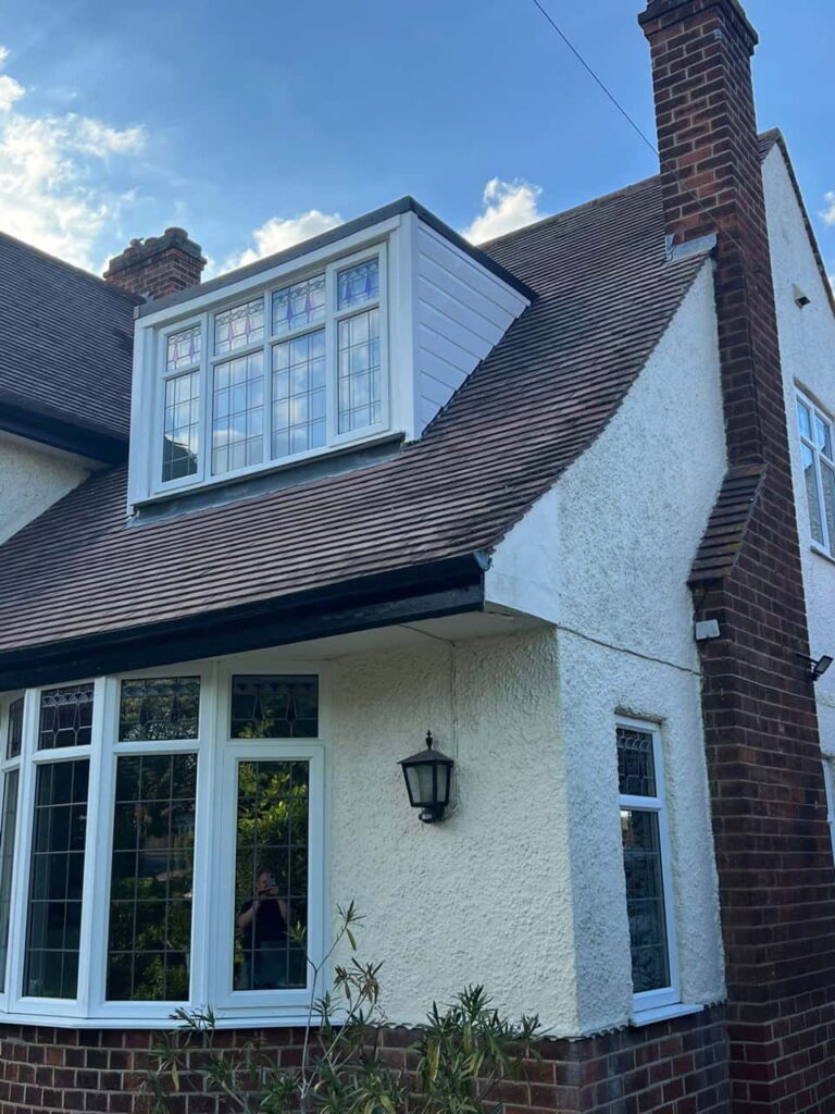 This is a photo of a dormer window which has just had some repairs carried out where the roof and the dormer meet. Works carried out by MCM Roofing Repairs Amesbury